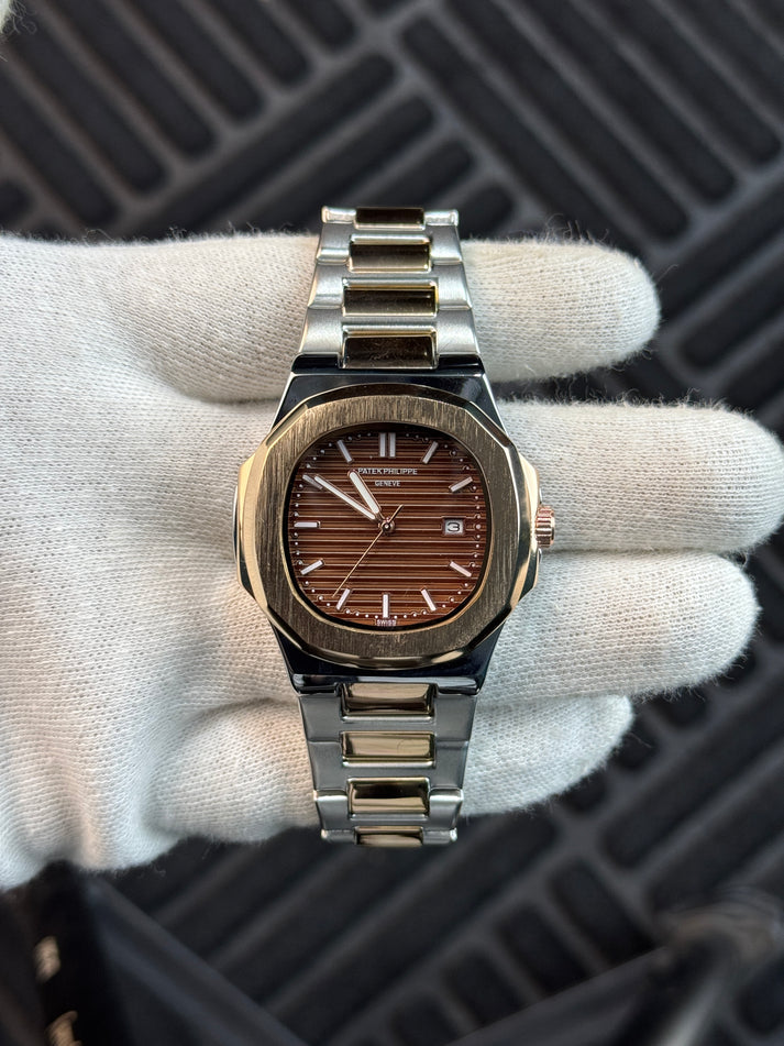 Patek Philippe - Nautilus -
Two Tone Gold